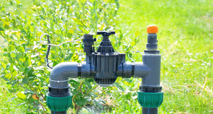 Close-up of a lawn sprinkler valve and irrigation control system—example of outdoor irrigation components used in diagnosing sprinkler valve issues in Indianapolis, IN.