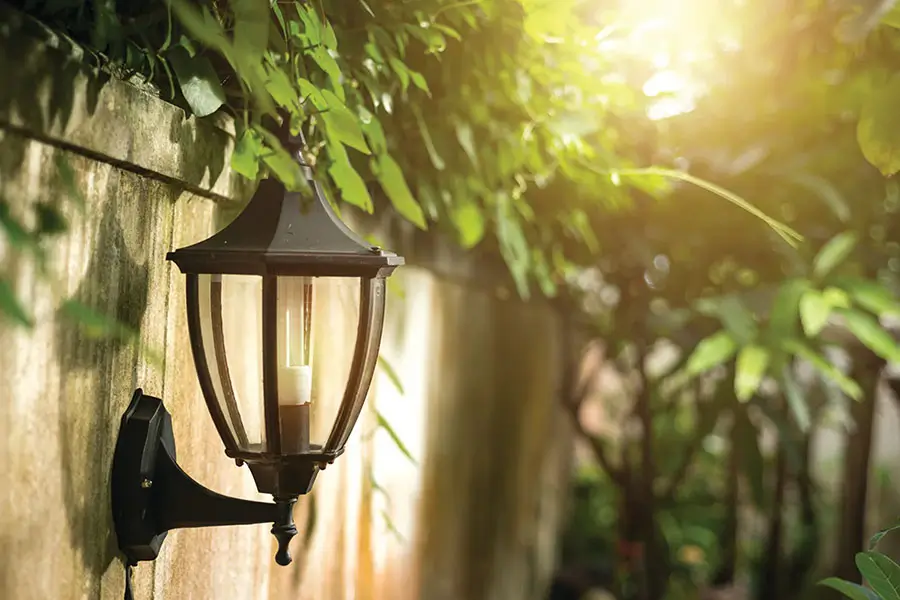Weatherproof outdoor wall lantern installed for reliable landscape lighting in Indianapolis, IN, designed to withstand rain, heat, and seasonal weather changes.