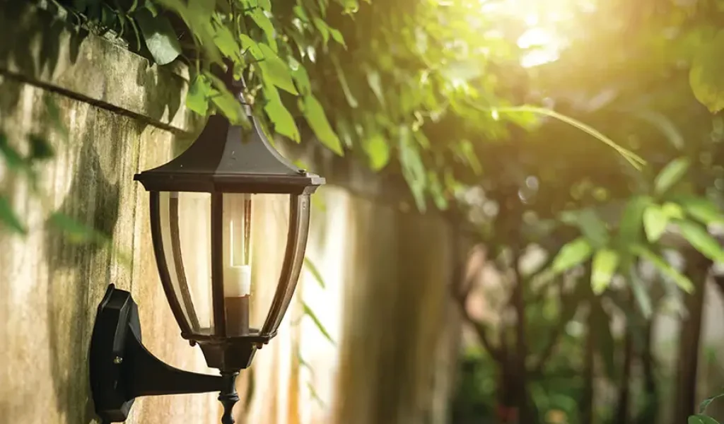 Weatherproof outdoor wall lantern installed for reliable landscape lighting in Indianapolis, IN, designed to withstand rain, heat, and seasonal weather changes.