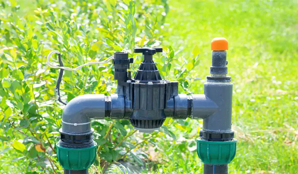Close-up of a lawn sprinkler valve and irrigation control system—example of outdoor irrigation components used in diagnosing sprinkler valve issues in Indianapolis, IN.